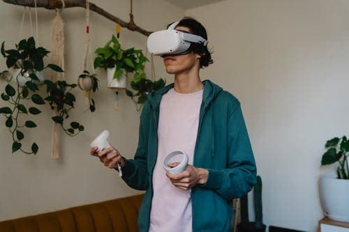 A person using VR headset in his house